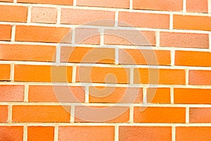 Fake ocher brick wall siding photo