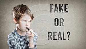 Fake or real, Boy on grunge background