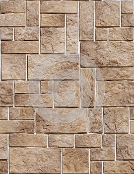 A fake stone in the form of a sharp bumpy coffee-colored tile