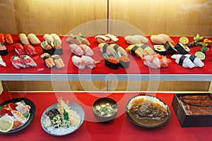 Fake sushi in display window - plastic food