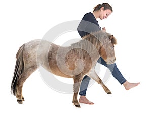 Falabella miniature horse and girl