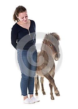 Falabella miniature horse and girl
