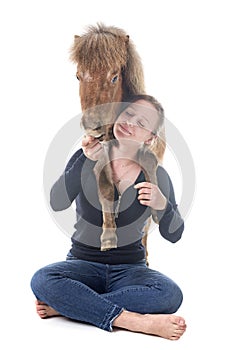 Falabella miniature horse and girl