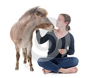 Falabella miniature horse and girl