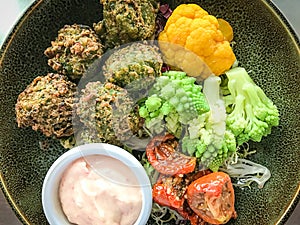 Falafel bowl with vegetables and cottage cheese dip