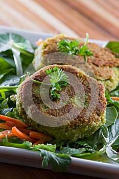 Falafels served on a green salad