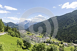 Falcade, Belluno, Veneto, Alpe, Dolomites: Summer mountains, nature. Italian city in the mountains. Idyllic landscape in the Alps photo