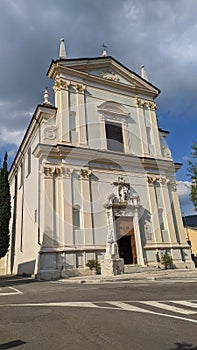 Falcade of a church in Botticino in Brescia, in Italy. Townscape with street photo