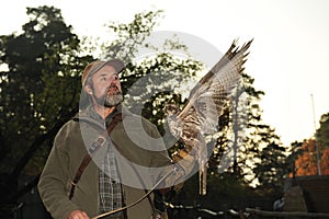 Falconer with Falcon,falco cherrug .