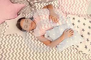 Fall asleep as fast as possible. Fall asleep faster and sleep better. Healthy sleep. Sweet dreams. Girl child lay bed photo