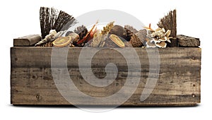 Fall autumn leaves, pine cones, dried fruit, nuts In Wood Crate