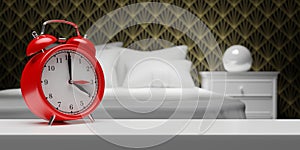 Fall Back Time. Daylight Saving End. Red alarm clock one hour back change