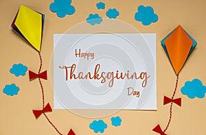 Fall Background With Kite, Clouds and Autumn Decoration and Text Happy Thanksgiving Day
