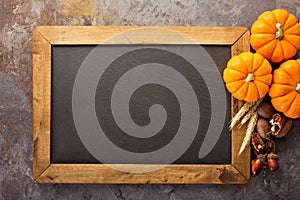 Fall chalkboard copy space with pumpkins