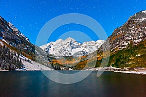 fall color at Maroon lake at night after snow in Aspen, Colorado