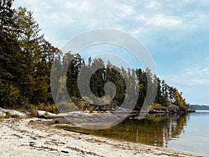 Fall colors, sandy beach on Lake of the Woods, Ontario