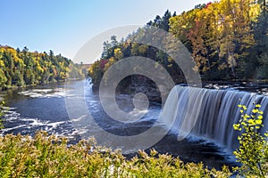 Fall colors at Tahquamenon Falls in Michigan