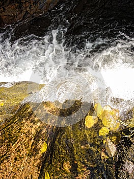 Fall Creek glowing waterfall and autumn leaves
