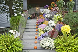 A fall decorated porch near Portland, Maine photo