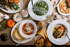 Fall dinner table overhead shot with salad and entrees