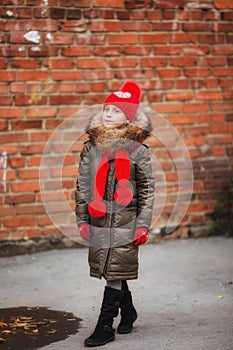 Fall fashion. Kid girl wear coat for fall season. Girl looking face cute hairstyle fashionable fall coat with hood and fur.