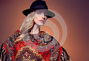Fall Fashion. Woman in Autumn Shawl. Stylish Hat