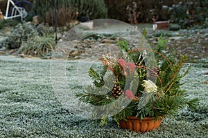 Fall Floral Decorations In A Basket For A Grave For All Souls` Day On The Lawn