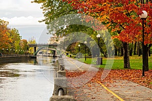 Fall foliage in Ottawa, Ontario, Canada. Rideau Canal Pathway autumn leaves scenery.