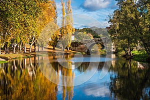 Fall foliage at river Arnoia in Allariz, Ourense photo