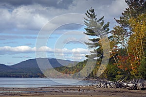 Fall foliage on shore of Flagstaff Lake in northwestern Maine.