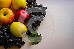 Fall fruits still life. Grapes and apples