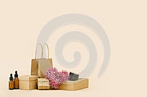 Fall Gift or Sale cosmetics concept. Shopping paper bag, autumn decor.