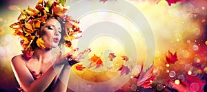 Fall Incoming - Model Woman Blowing Red Magic Leaves