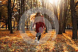 Fall its coming, Hello autumn. Beautiful blond girl on autumn background. Stylish young lady in park. Beautiful blond