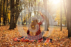 Fall its coming, Hello autumn. Beautiful blond girl on autumn background. Stylish young lady in park. Beautiful blond