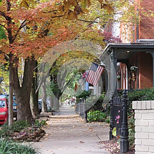 Fall leaves, old houses and the American flag. Lancaster, PA.