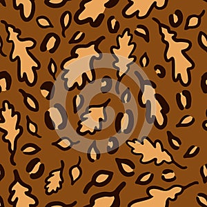 Fall Leopard or jaguar seamless pattern made of oak leaves. Trendy animal print with autumn colors. Vector background