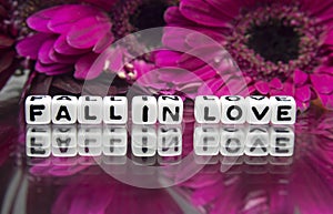 Fall in love message with pink big flowers