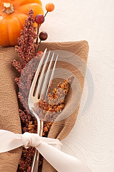 Fall Placesetting with Fork, Napkin and Pumpkin
