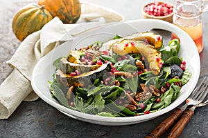 Fall salad with greens and acorn squash