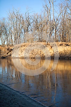 Fall scene on the frozen river