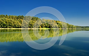 Fall Scene and Trees Autumn Reflection on Duna river