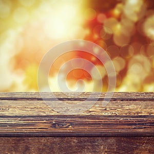 Fall season background with empty wooden table