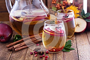 Fall sparkling drink with apple cider and pomegranate