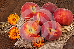 Fall still life peaches on old wooden table