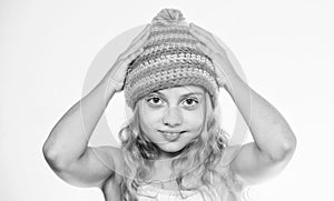 Fall winter season accessory. Free knitting patterns. Knitted hat with pompon. Girl long hair happy face white