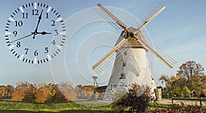 Fallback time. Abstract photo with windmill and Autumn landscape. Time change concept photo