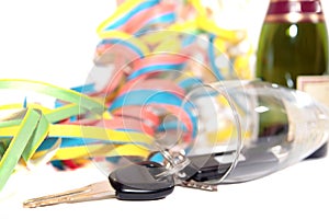 Fallen champagne flute and car keys