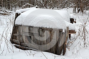 Fallen on its side hut for covert surveillance of animals