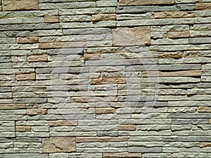 Large wall of small bricks painted texture